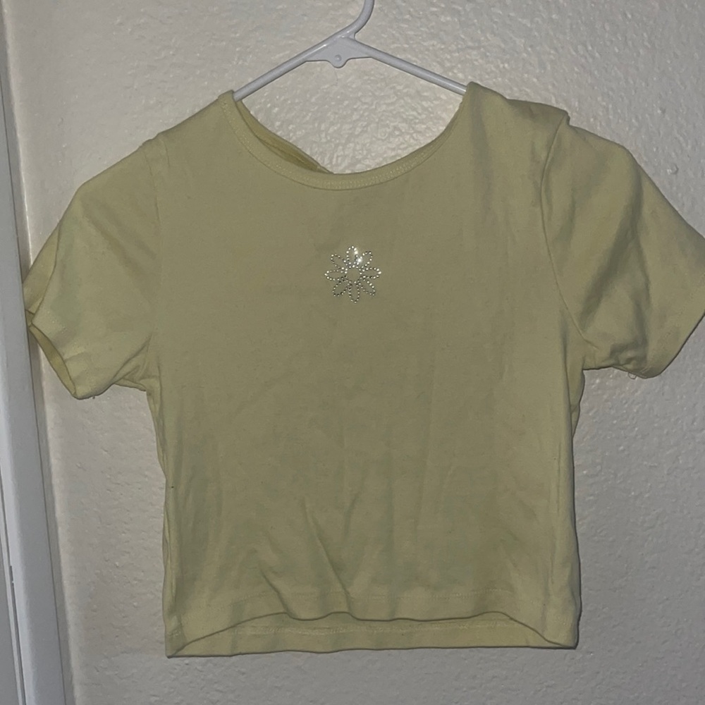 Yellow crop top with flower